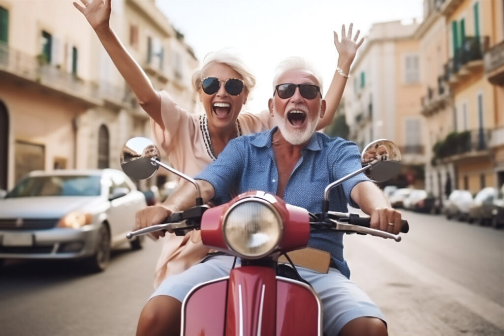 retired couple on scooter in Italy, Europe,